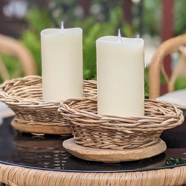 Hand-Woven Rattan & Mango Wood Live Edge Bowl, Set of 2 closeup holding candles