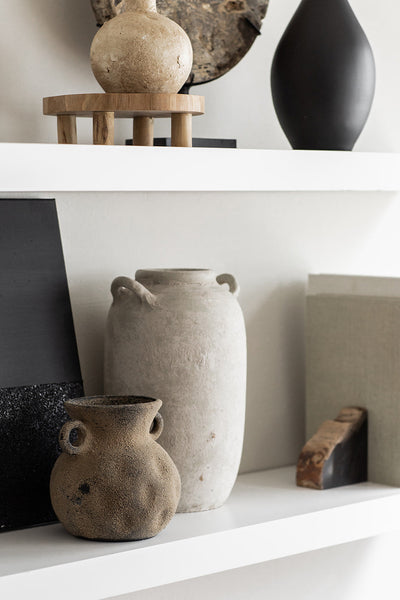 Binx Vase showing in a curated shelf collection