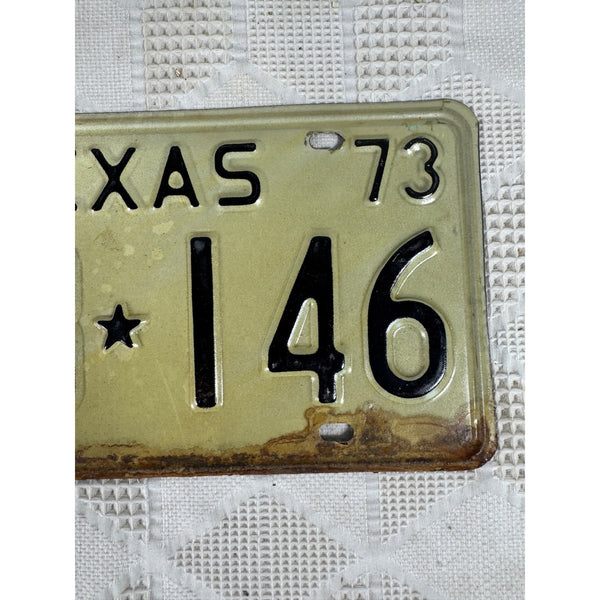 Vintage 1973 Texas License Plate FLB 146 Black Embossed Lettering On White Metal