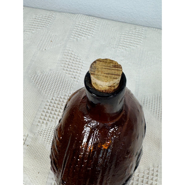 Vintage Clevenger Amber Glass Bottle w Embossed Eagle and Grapes Pattern 1950s