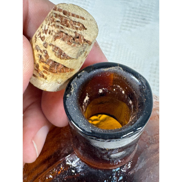 Vintage Clevenger Amber Glass Bottle w Embossed Eagle and Grapes Pattern 1950s