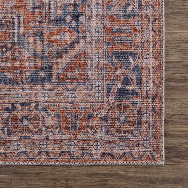 Taber Burnt Orange Washable Rug corner