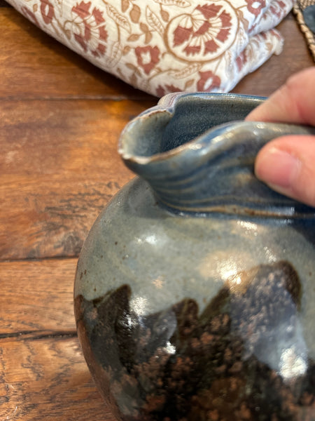 Handmade and Painted Pottery Pitcher chip view