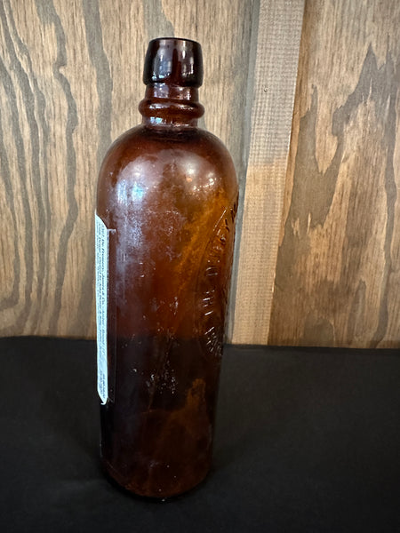 Antique Duffy Malt Whiskey Bottle side view