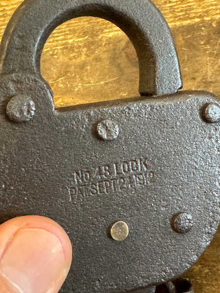 Antique St Louis San Francisco Railroad Padlock and key closeup on date