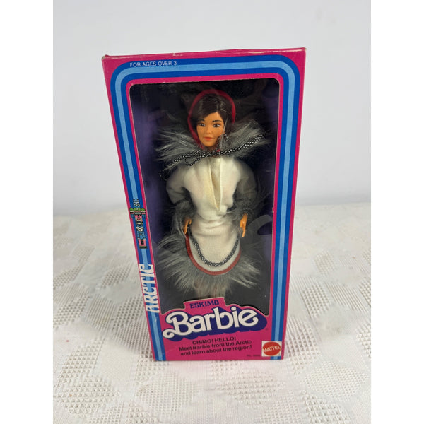 Vintage Mattel Barbie doll in its original packaging, featuring the 'Arctic' winter outfit. The box has a pink and blue border, and the doll is visible through the clear plastic window. Mattel Eskimo Barbie Doll Vintage 1981 Arctic Collection 3898 NIB