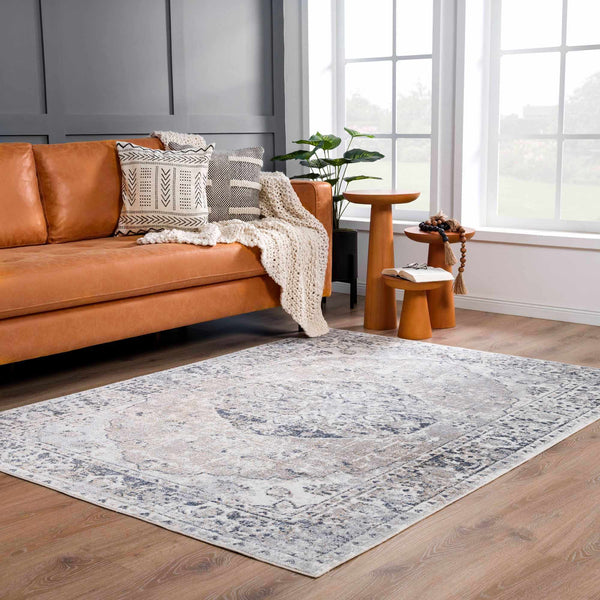 Rudo Cream Washable Area Rug in contemporary living room