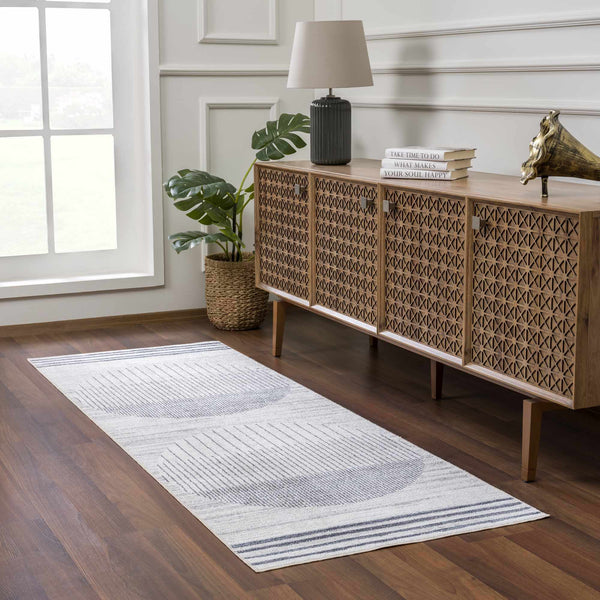 Thad Washable Area Rug runner in front of console