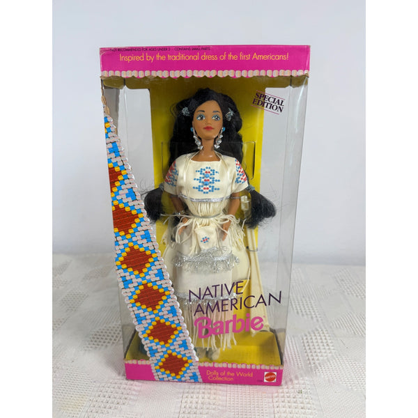 Native American Barbie doll in its original window box packaging, featuring a traditional patterned dress and accessories, with a pink and yellow themed box. Native American Barbie Dolls Of The World Collection 1992 Special Ed 1753 NIB 