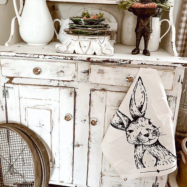 Mr. Rabbit Fabric Wall Art hanging from furniture