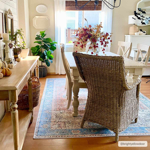 Rosman Distressed Washable Rug shown in dining room