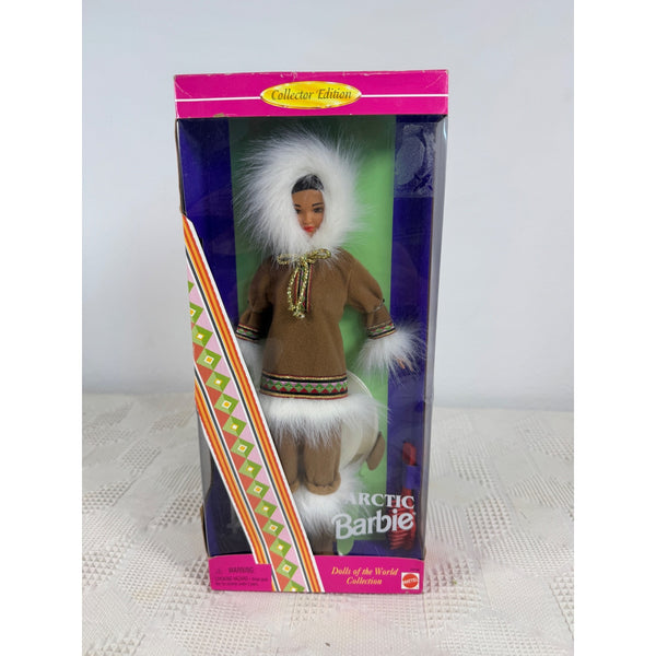 A boxed vintage Barbie doll from the Arctic of the World Collection, shown in its original packaging with a clear front window and pink and multicolor printed box design. Arctic Barbie Dolls Of The World Collection 1996 Special Edition 16495 NIB 