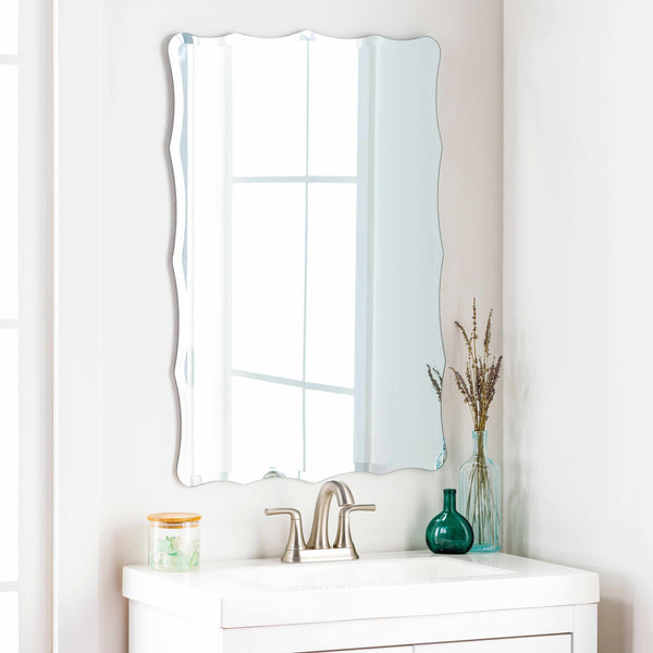 Daveluyville scalloped Mirror styled above bathroom sink