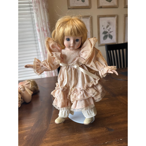 Vintage Porcelain Doll with Blonde Hair
