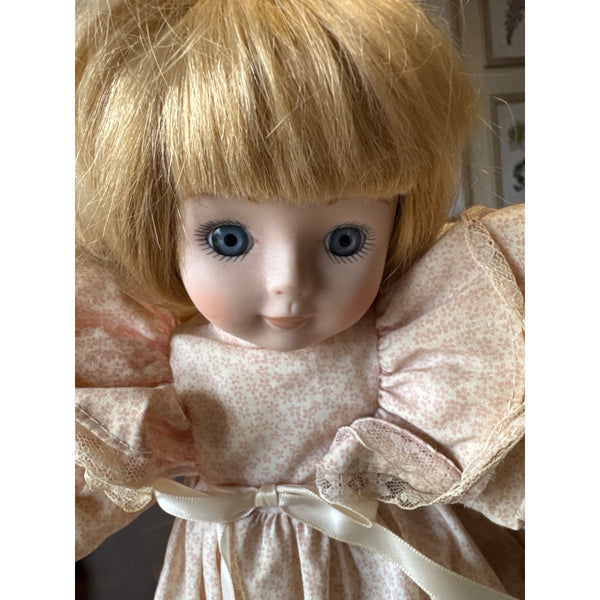 Vintage Porcelain Doll with Blonde Hair