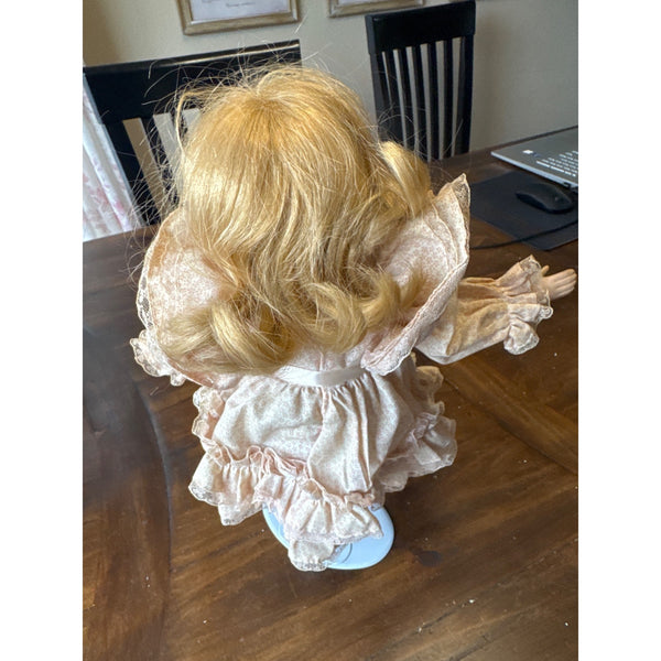 Vintage Porcelain Doll with Blonde Hair