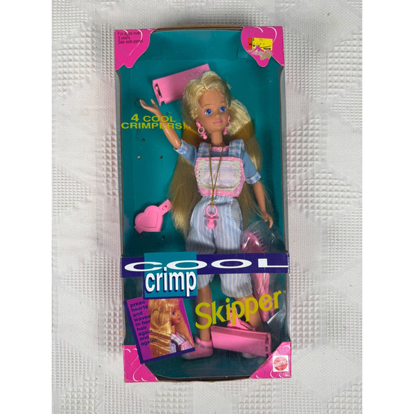 Cool Crimp Skipper doll in its original retail packaging, featuring blonde hair, a blue and white striped shirt, and pink accessories.