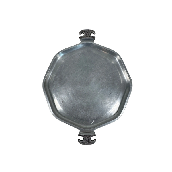 Guardian Service Hammered Aluminum Griddle Pan Handles Octagon Vintage Cookware. An octagonal silver metal serving tray with decorative handles, shown from above on a textured light gray fabric background.