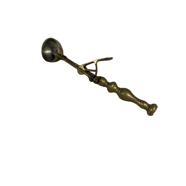 Antique Solid Brass & Nickel Gilchrists No 31 Mechanical Ice Cream Scoop Rare. A brass and silver-toned traditional Indian clay pot holder (kadhai) with a handle, resting on a white textured fabric background.