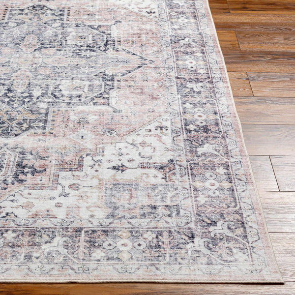 Luca Washable Area Rug on hardwood floor