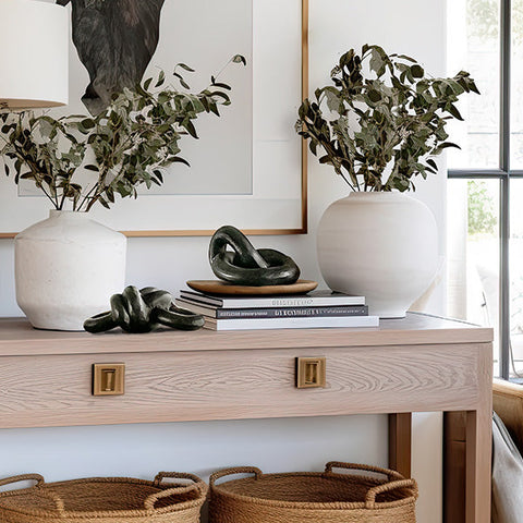 Chunky Metal Knot Decor displayed on console table