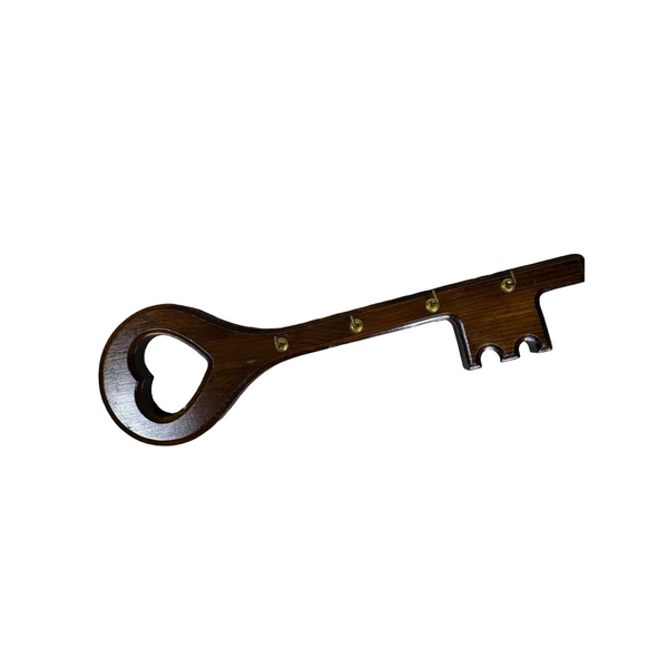 Vintage Wooden Note Photo or Recipe Holder w Clothes Iron Shape Mushroom Design. A wooden key-shaped bottle opener with a heart-shaped handle, resting on a textured off-white fabric background.