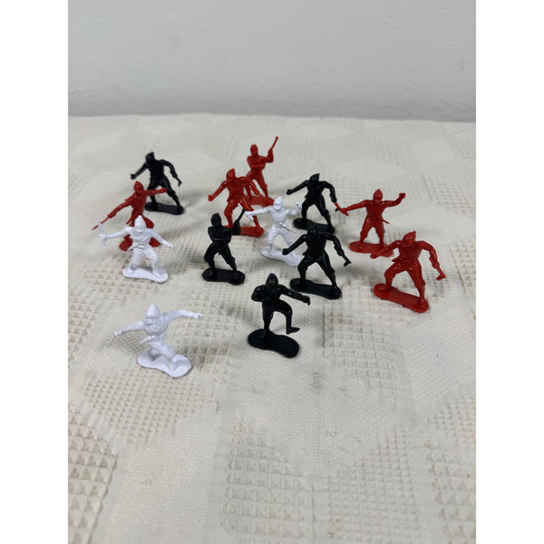 Vintage Plastic Ninja Figurines Set Of 13 In Red Black and White Army Men Style