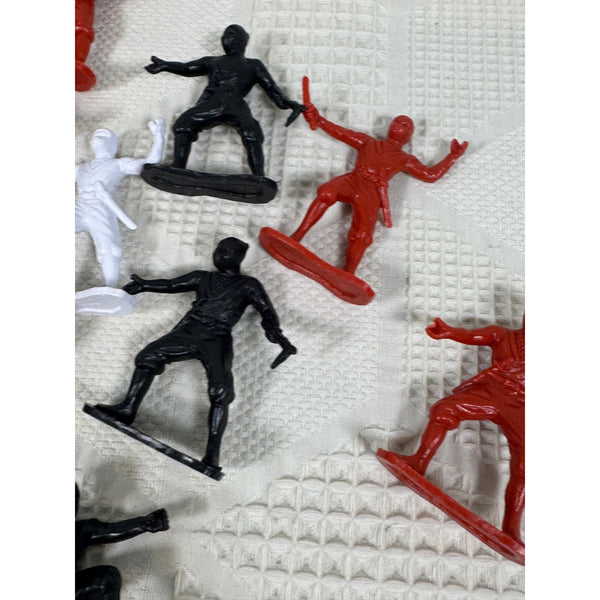 Vintage Plastic Ninja Figurines Set Of 13 In Red Black and White Army Men Style