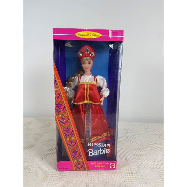 A boxed Russian Barbie doll in traditional dress, shown in its original retail packaging on a light surface against a plain light gray background. Russian Barbie Dolls Of The World Collection 1996 Special Edition 16500 NIB 