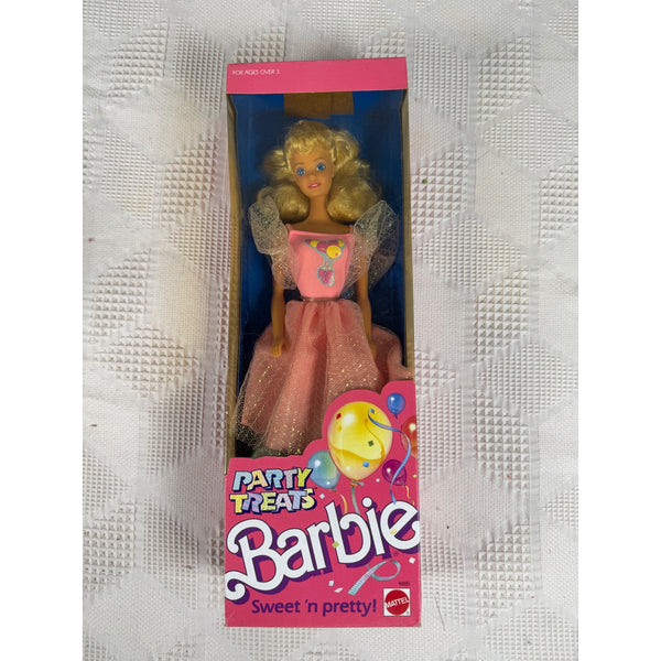 A vintage Barbie Party Treats doll in its original pink and blue packaging, displayed on a textured white fabric background. Party Treats Barbie Doll Vintage 1989 Sweet N Pretty Mattel 4885 NIB