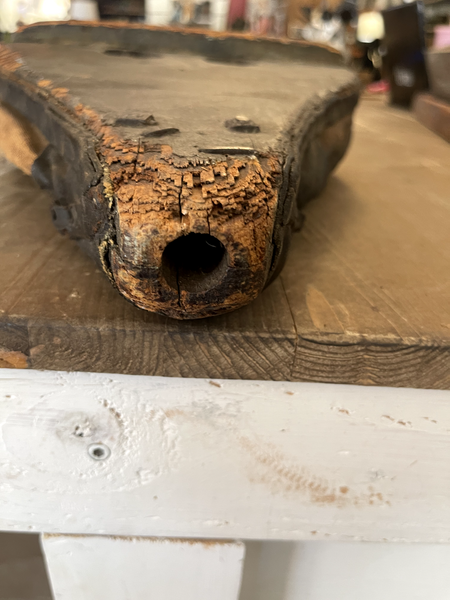 Antique Victorian era fireplace bellows spout is chipped and scorched and the leather was peeling up