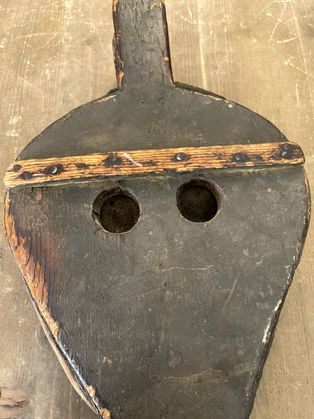 Antique Victorian era fireplace bellows has hole on the top and bottom