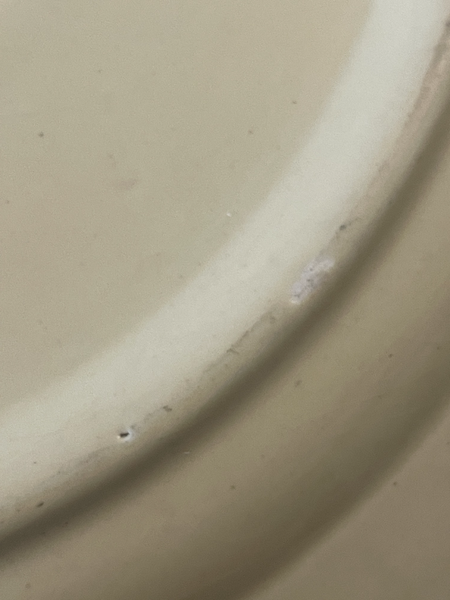 Vintage Bauer pottery platechip in the bottom