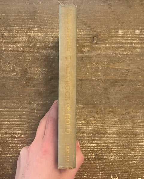 The Crock of Gold By James Stephens spine has some wear at the top and bottom, lettering is faded, and has discoloration