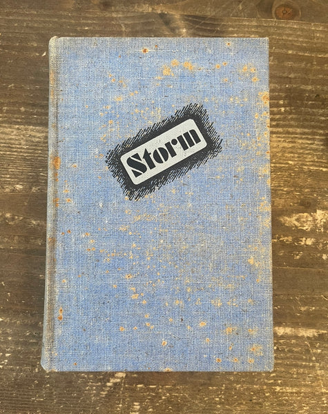 Storm by George R Stewart front cover has a lot of water damage spots