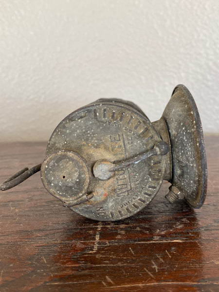 Antique Auto Lite Miners Lamp, top view with small rust spots.