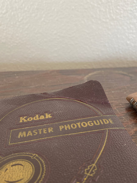 Vintage Kodak photoguide set, up close of the dogeared book.