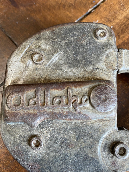 Antique Adlake GTW railroad padlock, close up of front of lock saying "adlake".