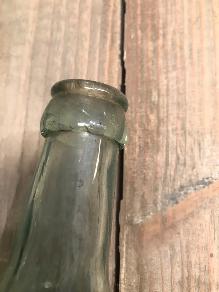 antique torpedo bottle with applied tooled lip